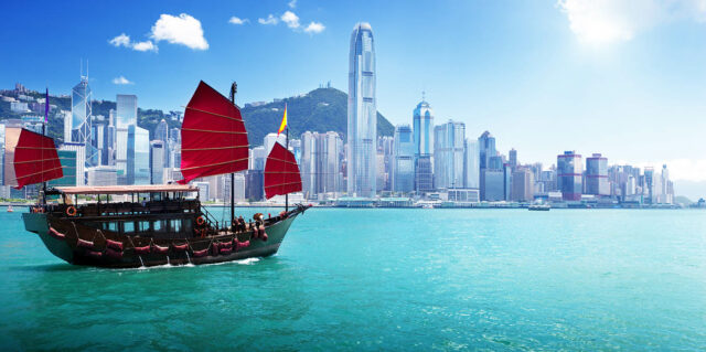 CILT Sutainable Transport in Hong Kong with the skyline and a boat