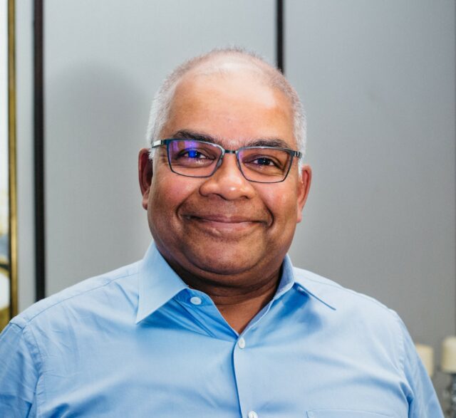 An image of Romesh David